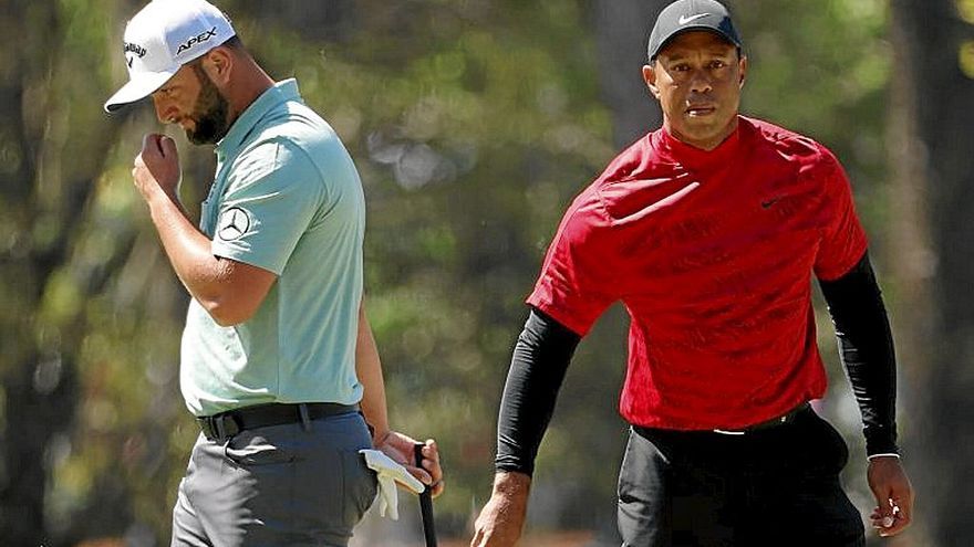 Tiger Woods, junto a Jon Rahm.