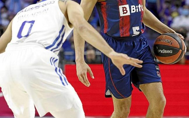 Baldwin trata de superar la defensa de William-Goss. Foto: ACB Media / P. Castillo