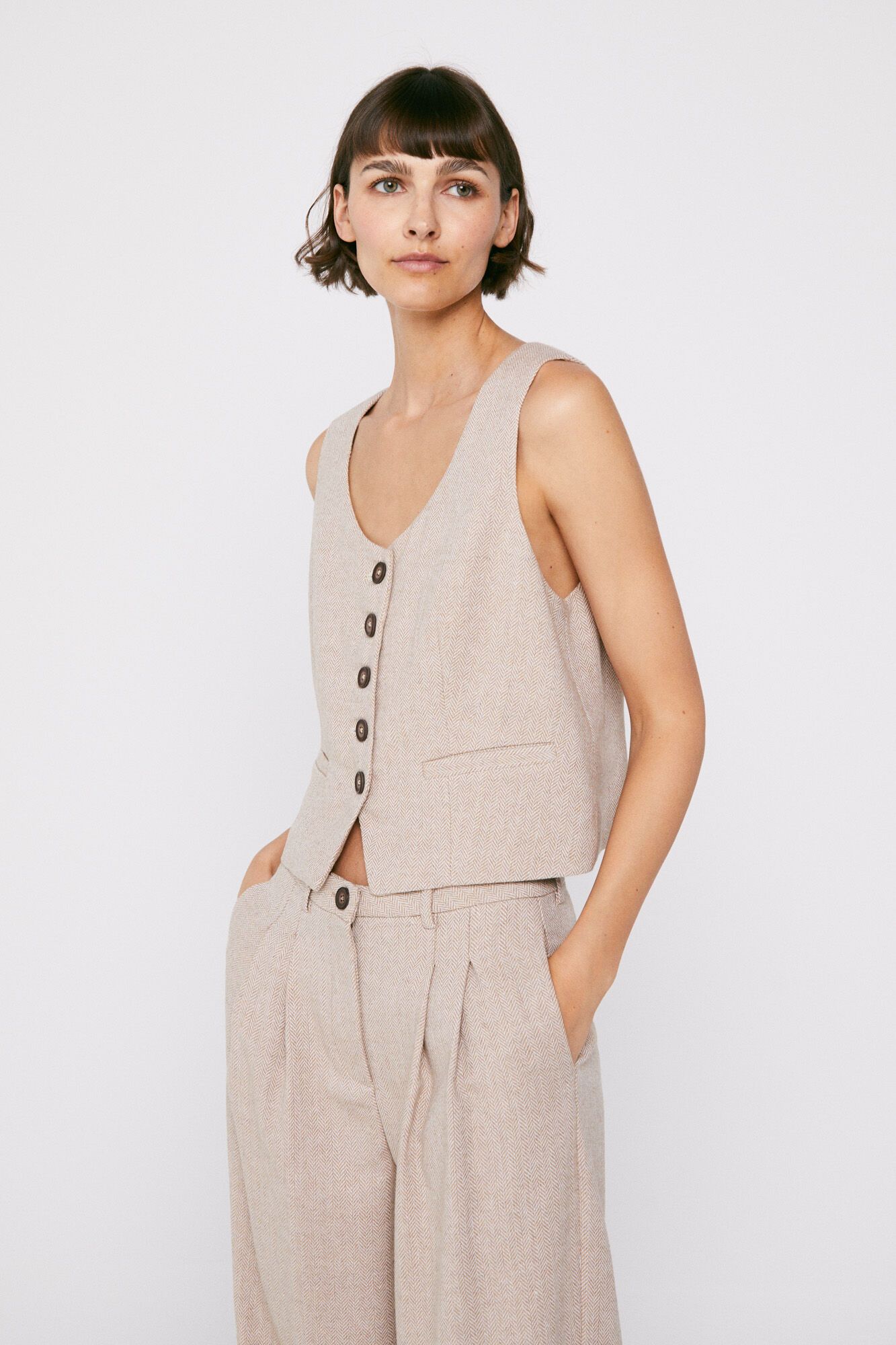 Chaleco con tejido de espiga.