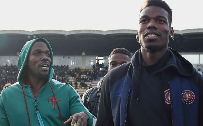 Paul Pogba junto a su hermano Mathias (izquierda), ahora detenido Paul Pogba junto a su hermano Mathias (izquierda), ahora detenido