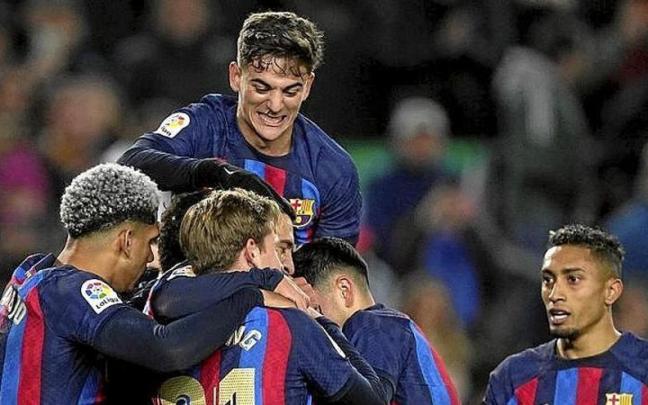 Los azulgranas, celebrando uno de sus tres goles al Sevilla. Los azulgranas, celebrando uno de sus tres goles al Sevilla.