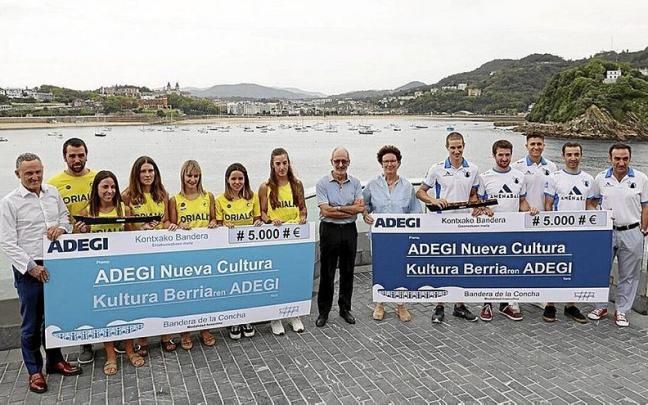 Entrega de premios Adegi a las remeras de Orio y los remeros de Donostiarra. | FOTO: IKER AZURMENDI