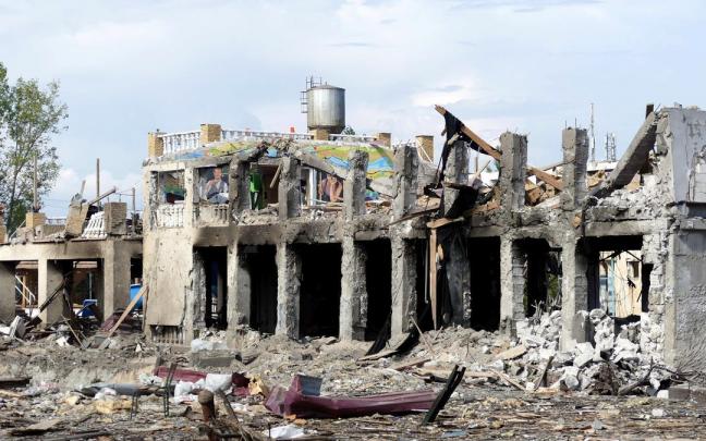 Devastación causada por un misil ruso en Ucrania. Devastación causada por un misil ruso en Ucrania.