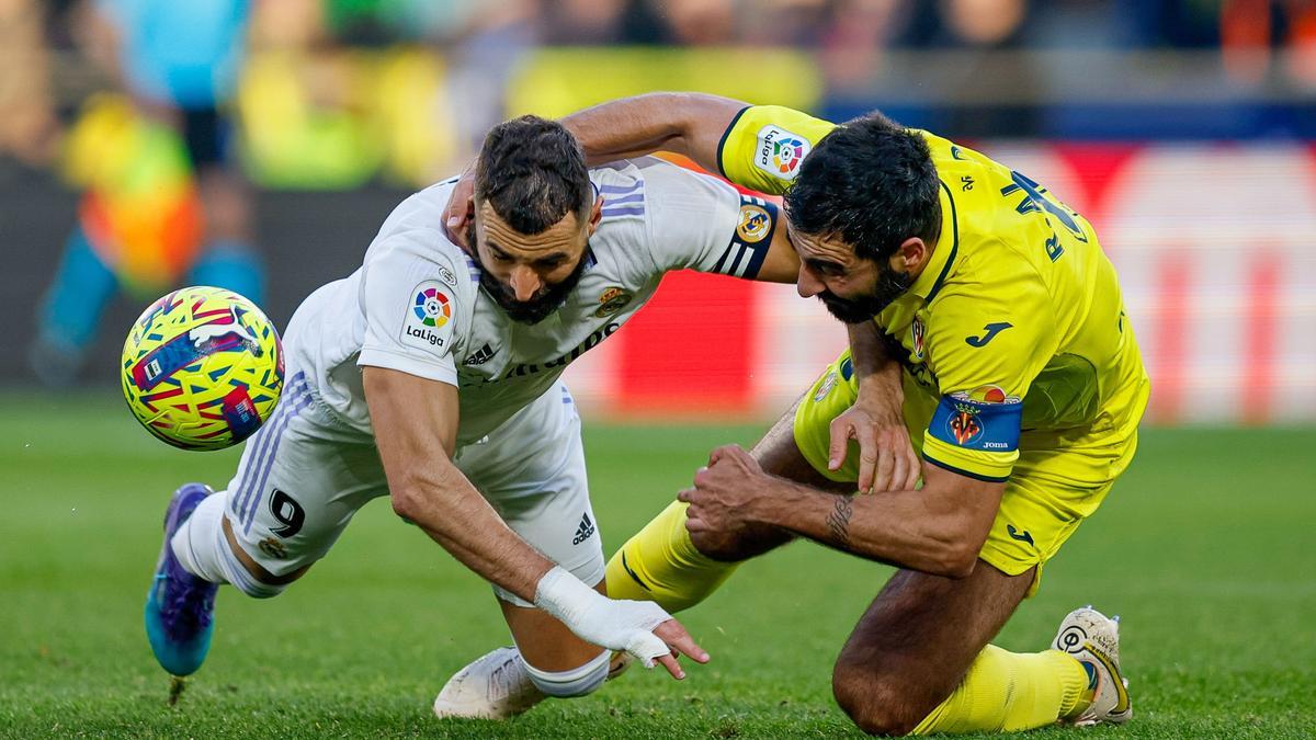 Raúl Albiol y el delantero francés del Real Madrid, Karim Benzemá.