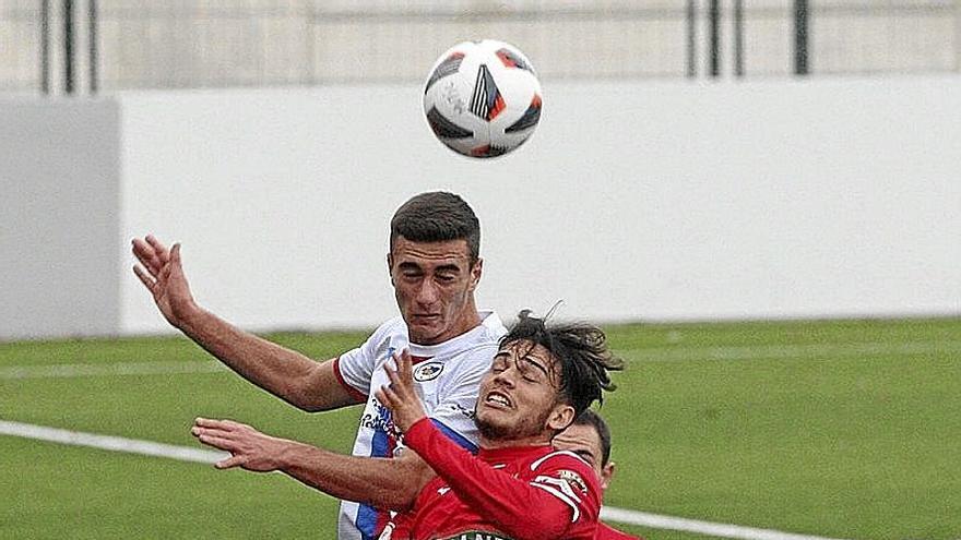 Lance del encuentro pasado entre Tudelano y Mutilvera.