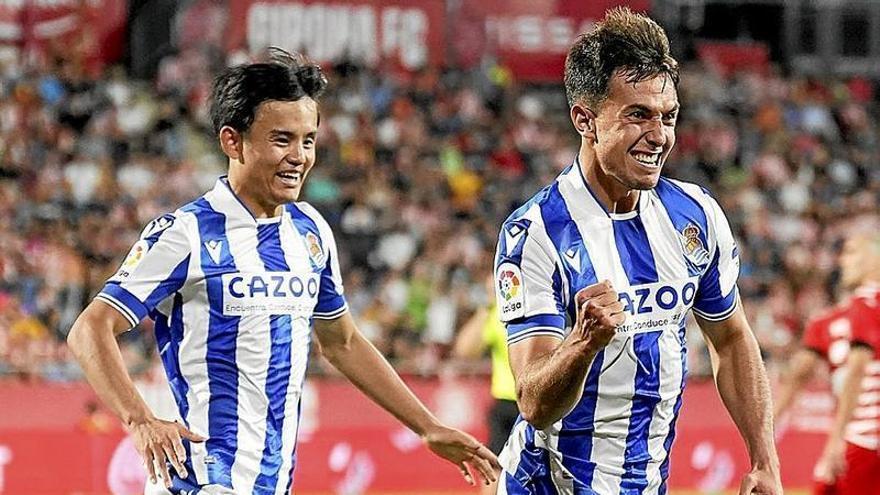 Martin Zubimendi celebra el gol que le marcó al Girona con Take Kubo. | FOTO: EFE