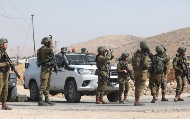 Tropas israelíes cerca del poblado de Nablus, en la Cisjordania ocupada. Tropas israelíes cerca del poblado de Nablus, en la Cisjordania ocupada.