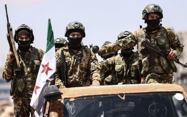 Militares del Ejército sirio en la ciudad de Alepo (Siria). Militares del Ejército sirio en la ciudad de Alepo (Siria).