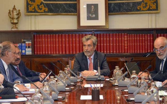 Carlos Lesmes (c), presidente del Consejo General del Poder Judicial.