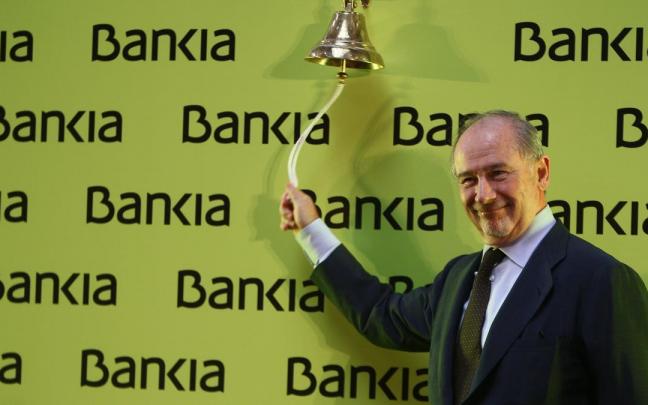Imagen de Rodrigo Rato tocando la campana cuando Bankia salió a Bolsa. Imagen de Rodrigo Rato tocando la campana cuando Bankia salió a Bolsa.