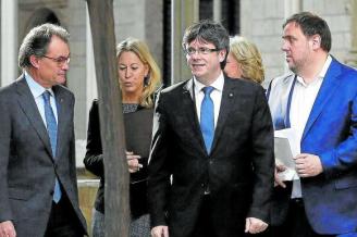 Mas, Puigdemont y Junqueras, entre los 34 ex altos cargos multados por la actividad de Diplocat. Foto: Efe