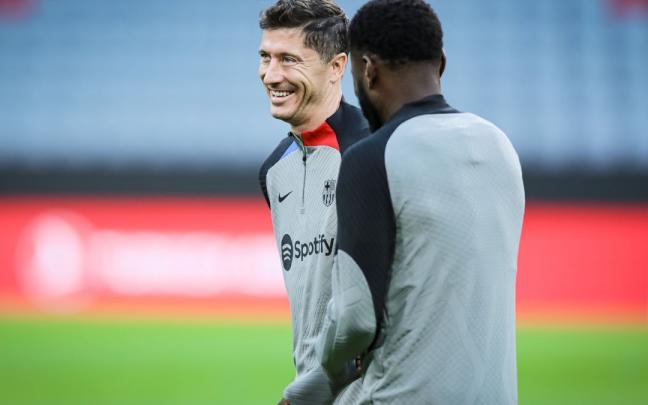 Lewandowski y Kessie, en el Allianz Arena este lunes. Lewandowski y Kessie, en el Allianz Arena este lunes.