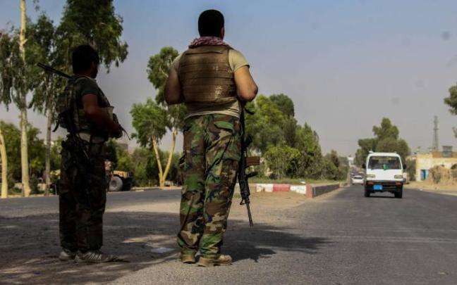 Las fuerzas de seguridad afganas en un puesto de control cerca de la frontera de Spin Boldak con Pakistán.