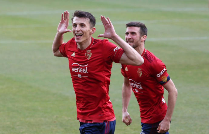 Budimir, celebrando con Oier un gol al Granada.