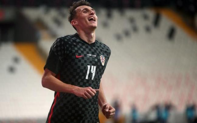Budimir celebra un gol con la selección de Croacia. Budimir celebra un gol con la selección de Croacia.