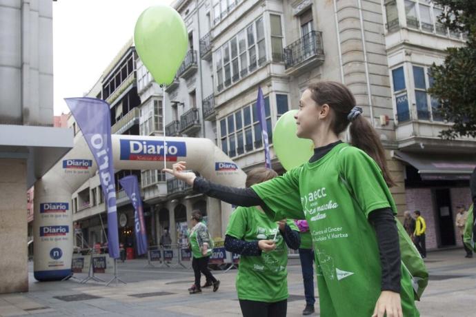 Participantes en la Marcha Contra el Cáncer organizada por la Asociación Española Contra el Cáncer (AECC) en octubre.