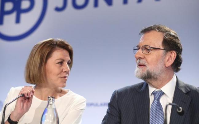 María Dolores de Cospedal y Mariano Rajoy durante una Junta Directiva del PP. María Dolores de Cospedal y Mariano Rajoy durante una Junta Directiva del PP.