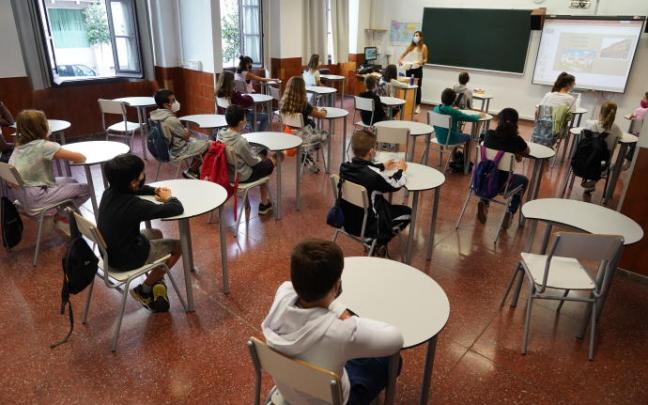 Escolares en un aula. Escolares en un aula.