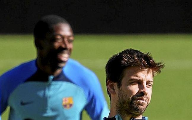 Gerard Piqu&eacute;, en el entrenamiento de ayer en el Camp Nou. | FOTO: EFE