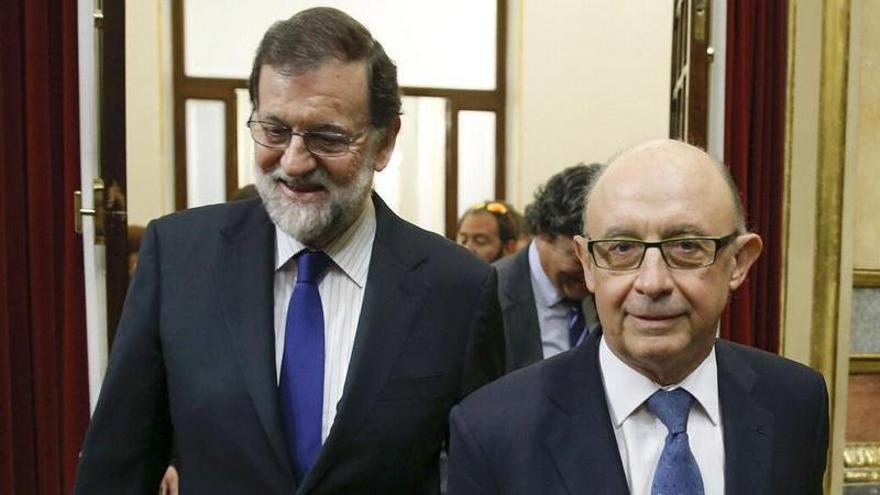 Rajoy y Montoro, en una imagen de archivo.