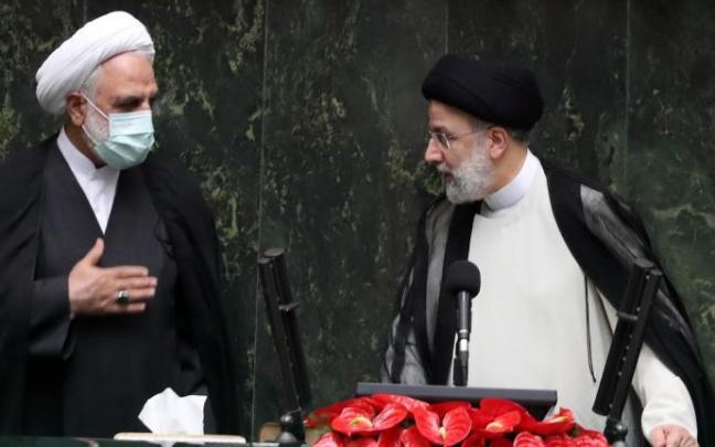 El presidente de Irán, Ebrahim Raisi (d) El presidente de Irán, Ebrahim Raisi (d)