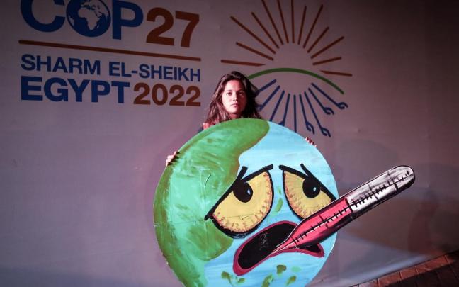 Una activista en la Cumbre del Clima de Egipto. Una activista en la Cumbre del Clima de Egipto.