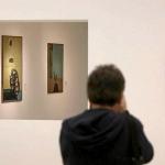 Un hombre observa varias de las obras de Carlos Sanz en Kubo Kutxa. | FOTO: GORKA ESTRADA