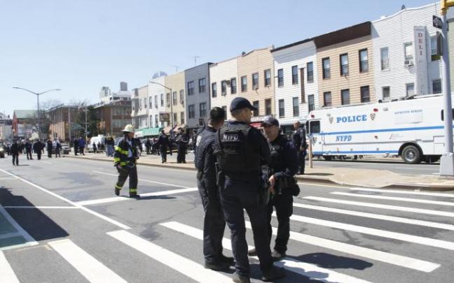 La Policía durante un tiroteo. La Policía durante un tiroteo.