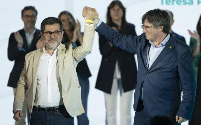 Jordi Sànchez y Carles Puigdemont, en el acto de Junts de este sábado.