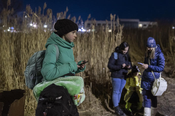 Refugiados en la frontera entre Ucrania y Polonia.