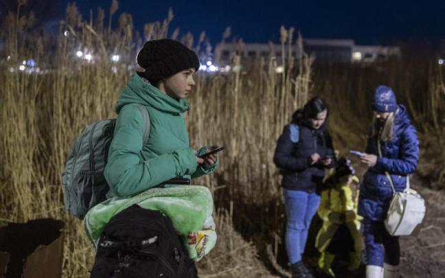 Refugiados en la frontera entre Ucrania y Polonia.