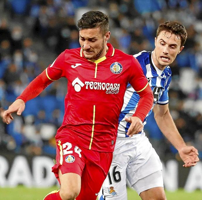 Óscar Rodríguez y Ander Guevara, durante el último choque entre la Real Sociedad y el Getafe. Foto: Efe