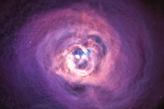 Fotografía astronómica del cumulo de galaxias Perseo con su agujero negro en el centro.