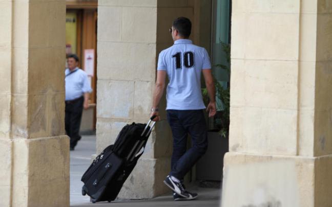 Un turista con la maleta.