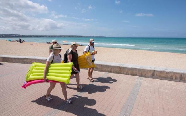 Turistas alemanes disfrutando de sus vacaciones.