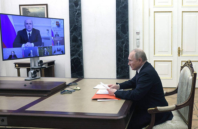 Putin durante un encuentro vía telemática desde el Kremlin.