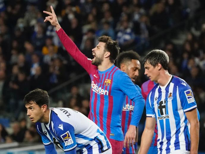 Piqué en un lance del partido